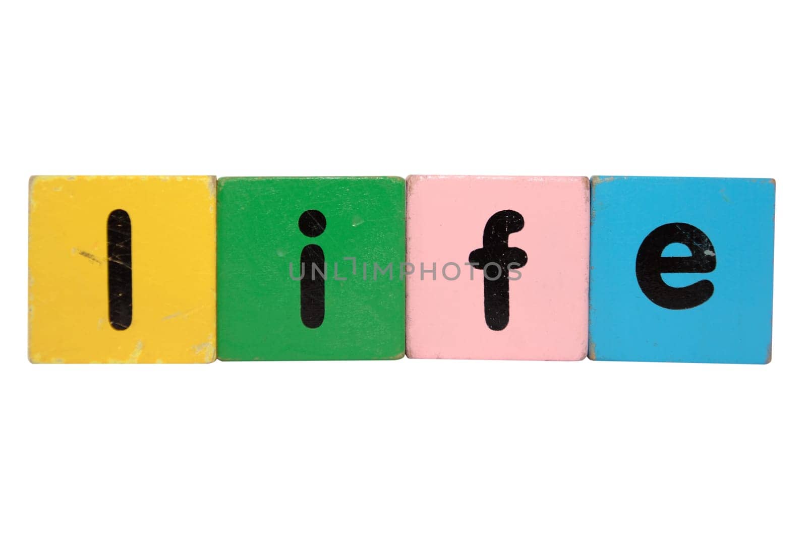 toy letters that spell life against a white background with clipping path