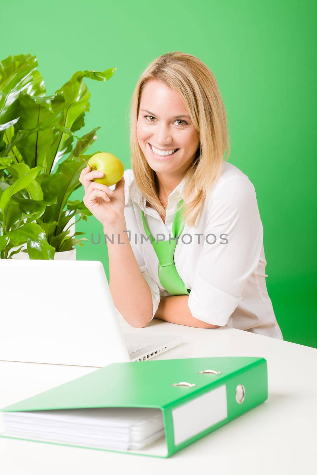 Green business office woman smiling hold apple plant environment friendly