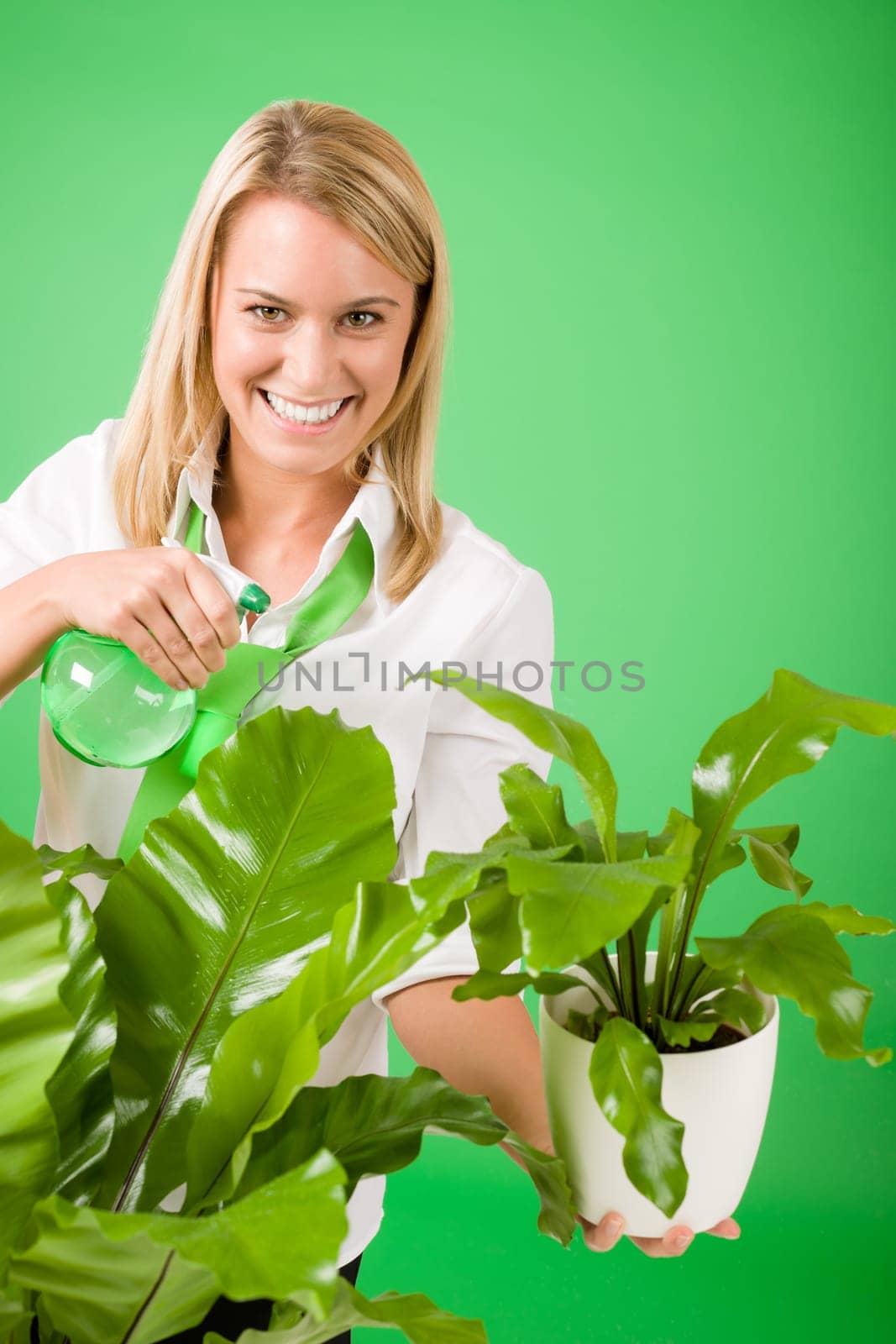 Green business woman water houseplant environment friendly smile