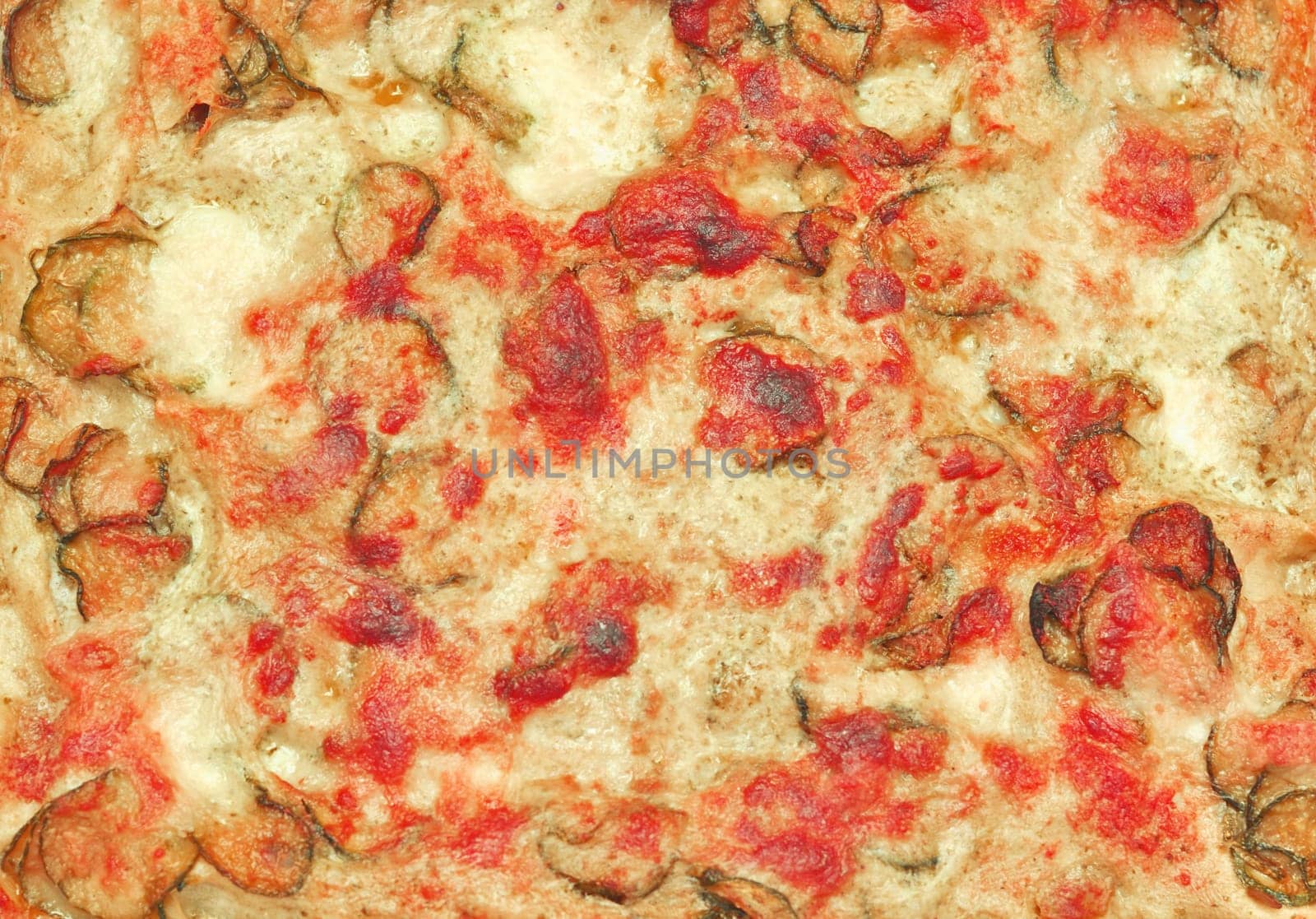 Detail of courgettes (zucchini) pizza with vegetables