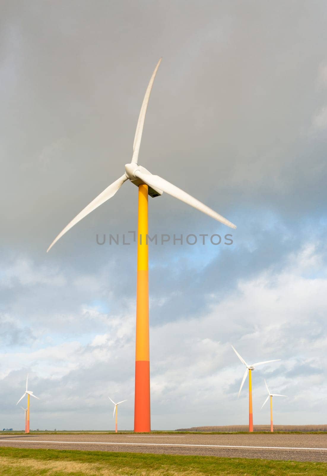 windmill farm with colorful windmills in Almere, netherlands