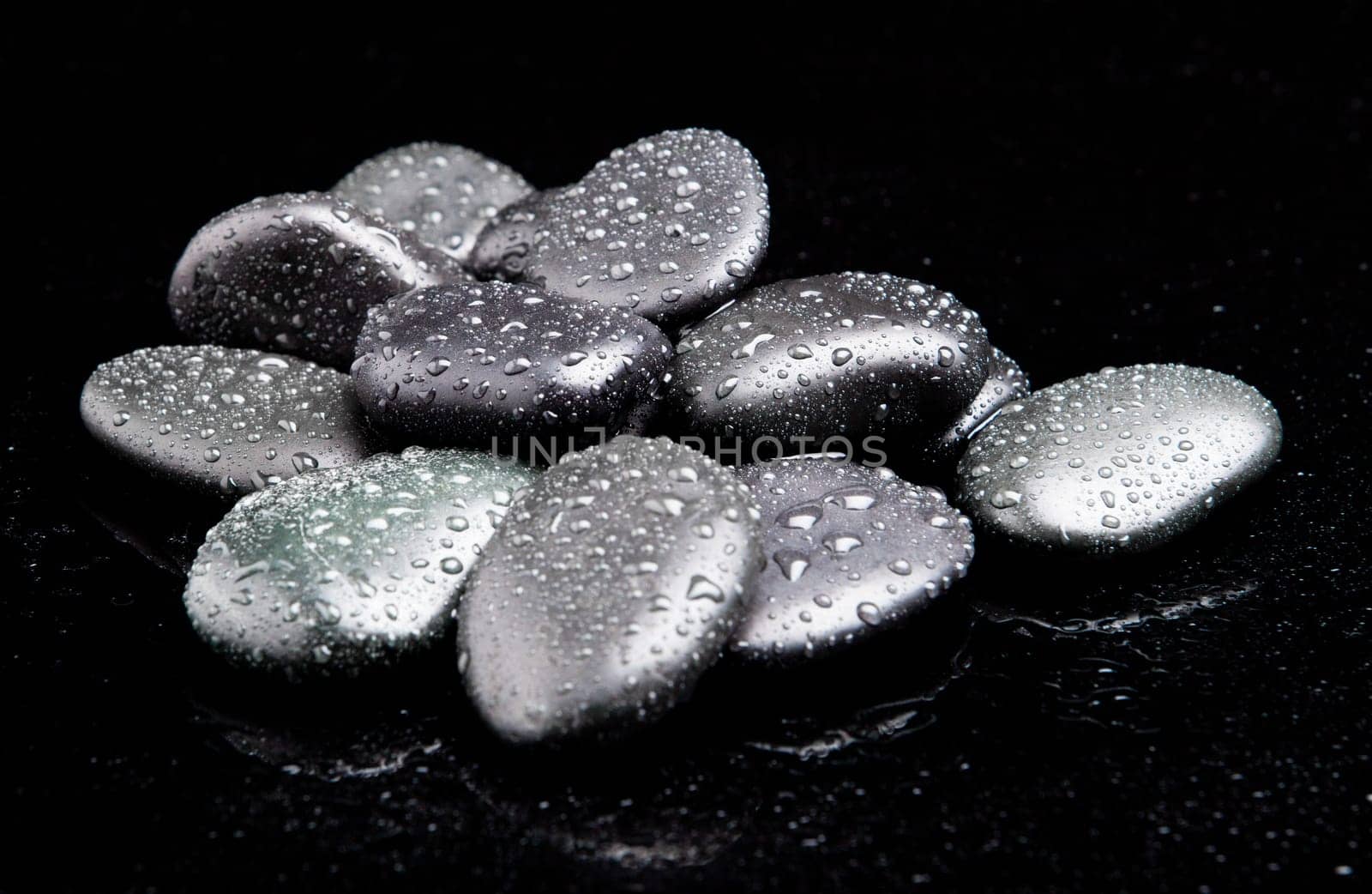 Spa Stones. shiny zen stones with water drops