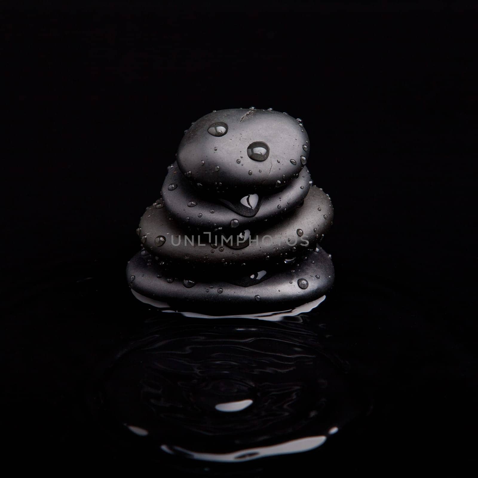Spa Stones. shiny zen stones with water drops