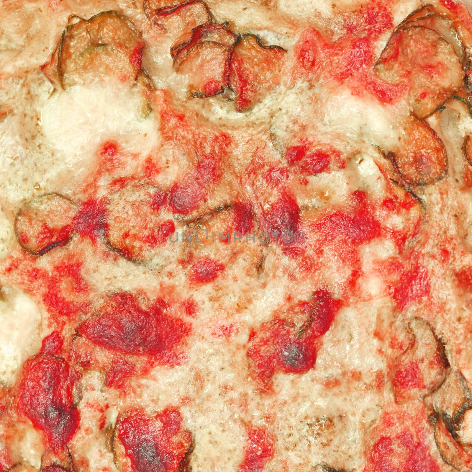 Detail of courgettes (zucchini) vegetarian pizza