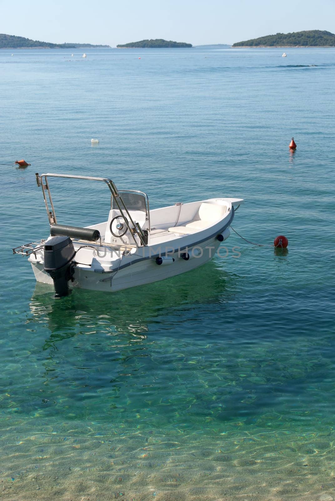 boat on the clear sea of Sibenik in Croatia
