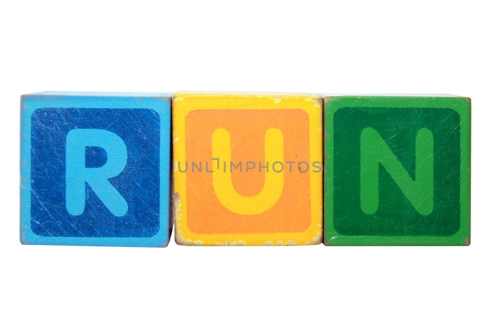 toy letters that spell run against a white background with clipping path