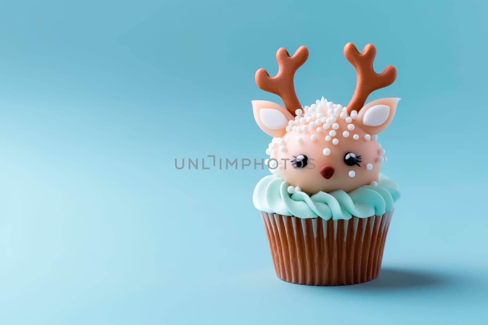 Christmas cupcake with decoration in the form of a fawn by Spirina