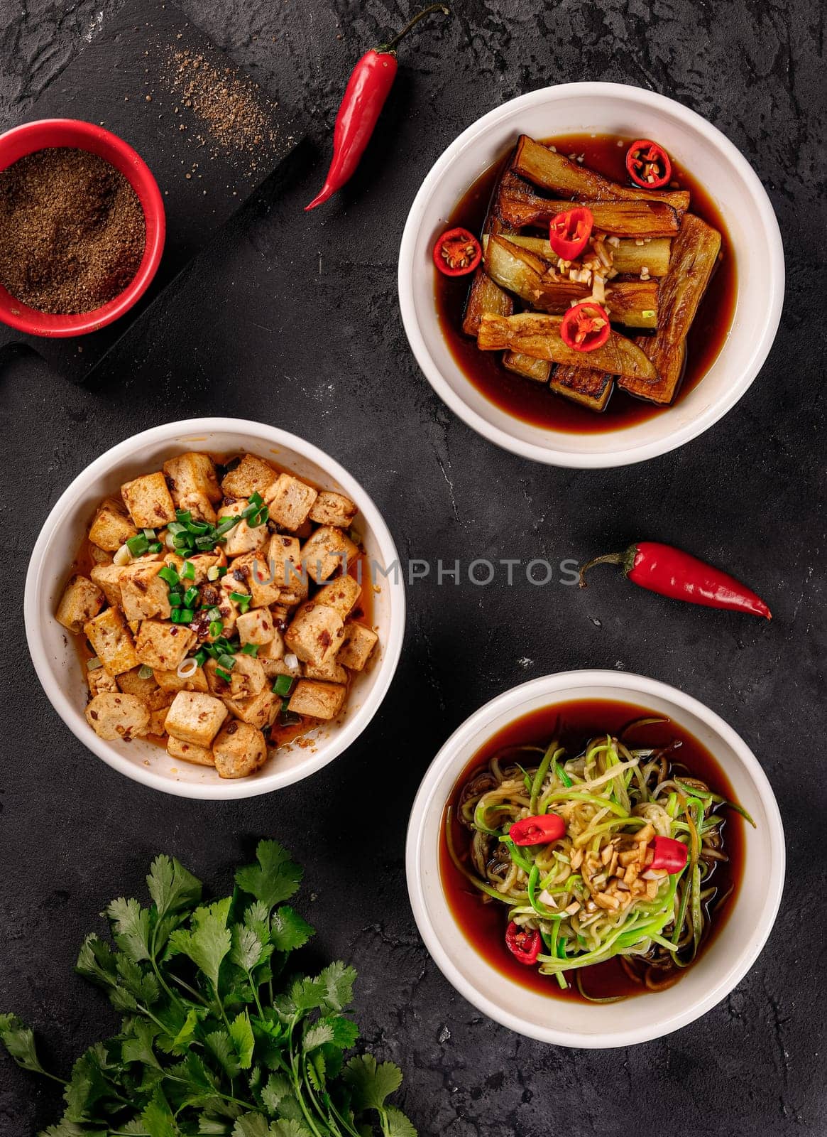 Asian dishes with chicken and green onions