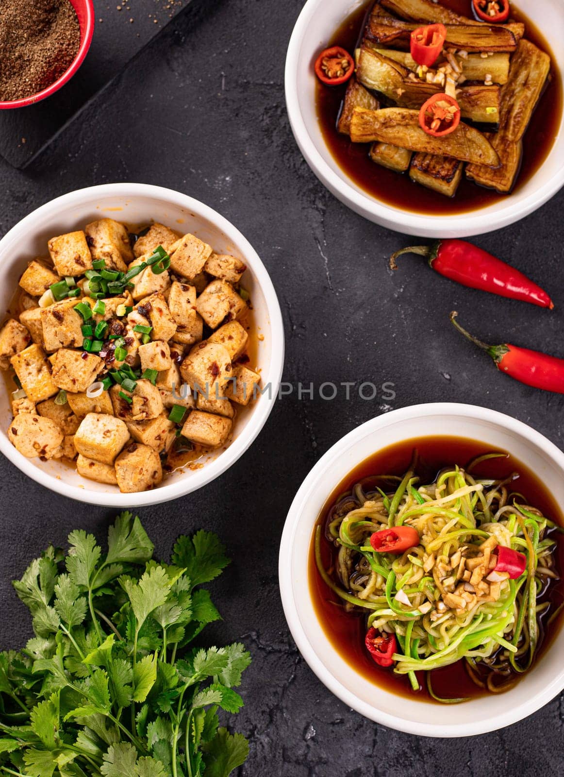 Asian dishes with chicken and green onions