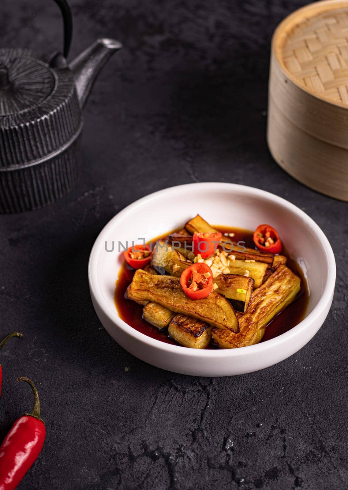 fried eggplant in soy sauce with garlic