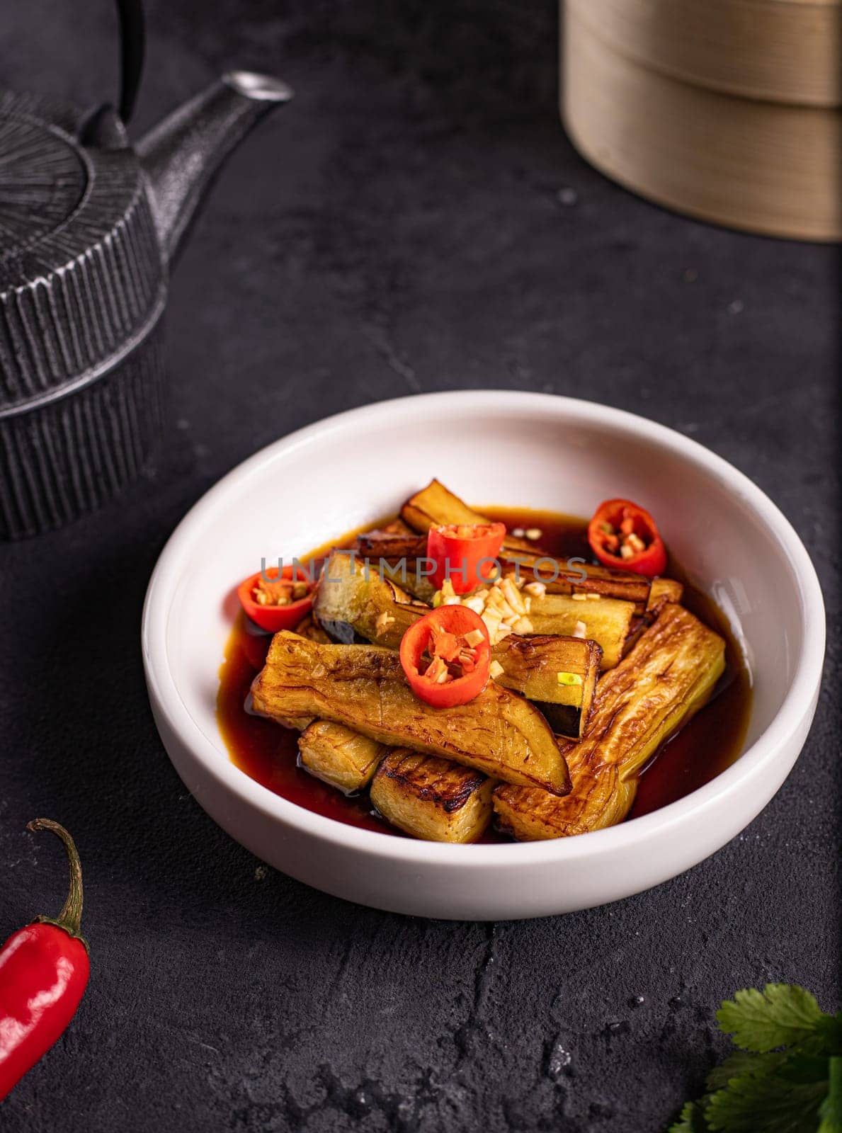 fried eggplant in soy sauce with garlic