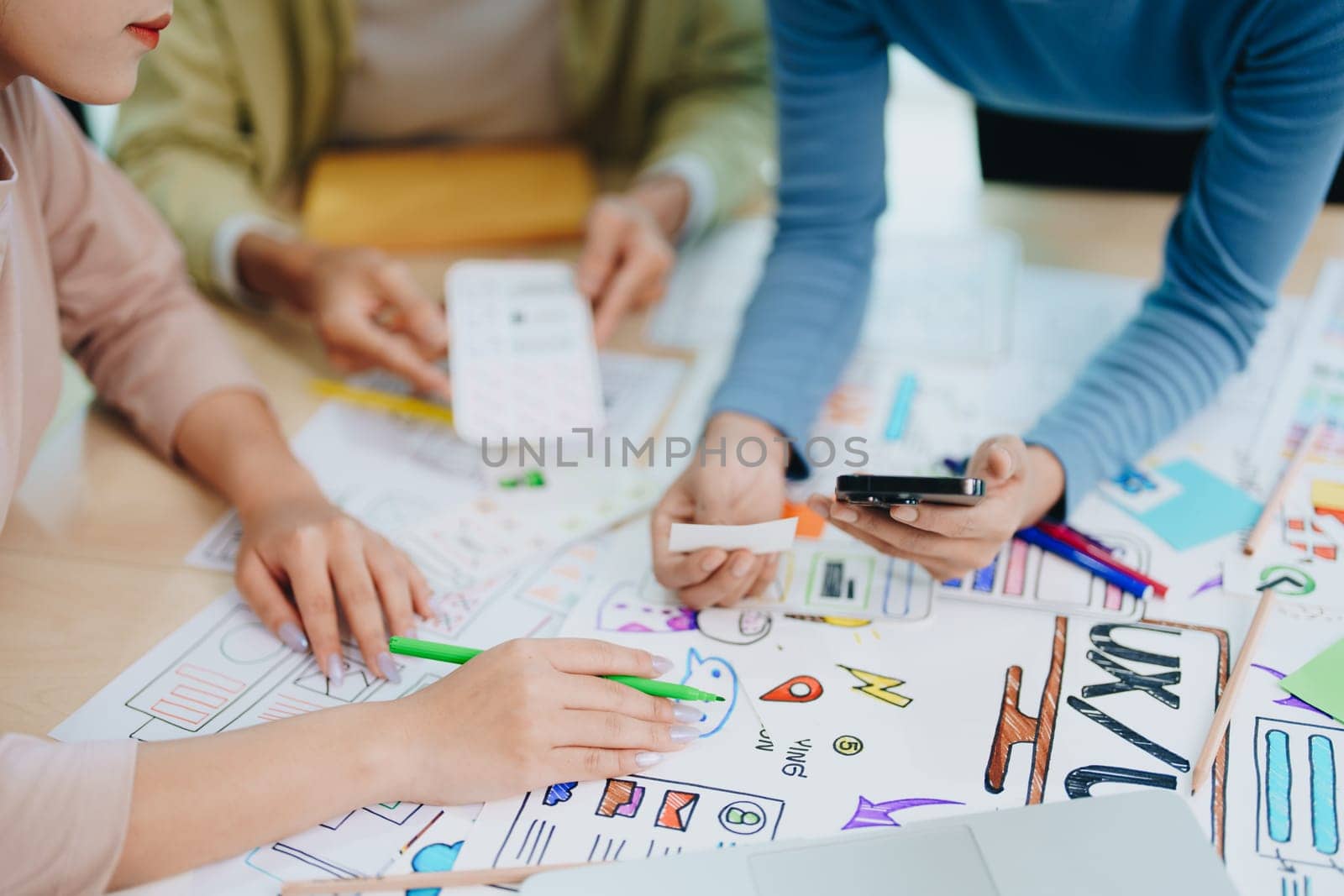 Team of Creative Web, Graphic Designer planning for mobile phone, drawing website ux ui app for mobile phone application and development template layout, process to developing prototype wireframe