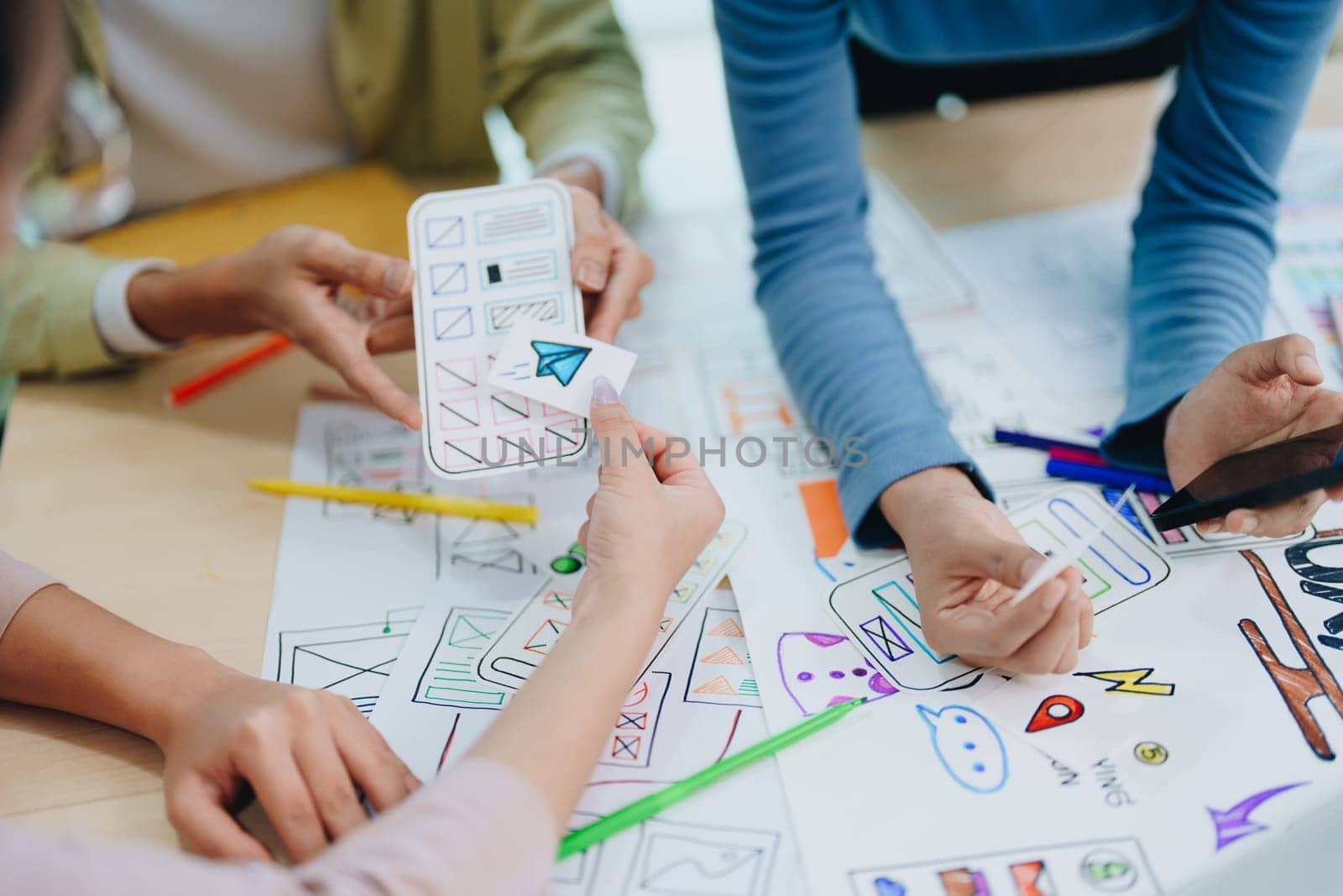 Team of Creative Web, Graphic Designer planning for mobile phone, drawing website ux ui app for mobile phone application and development template layout, process to developing prototype wireframe