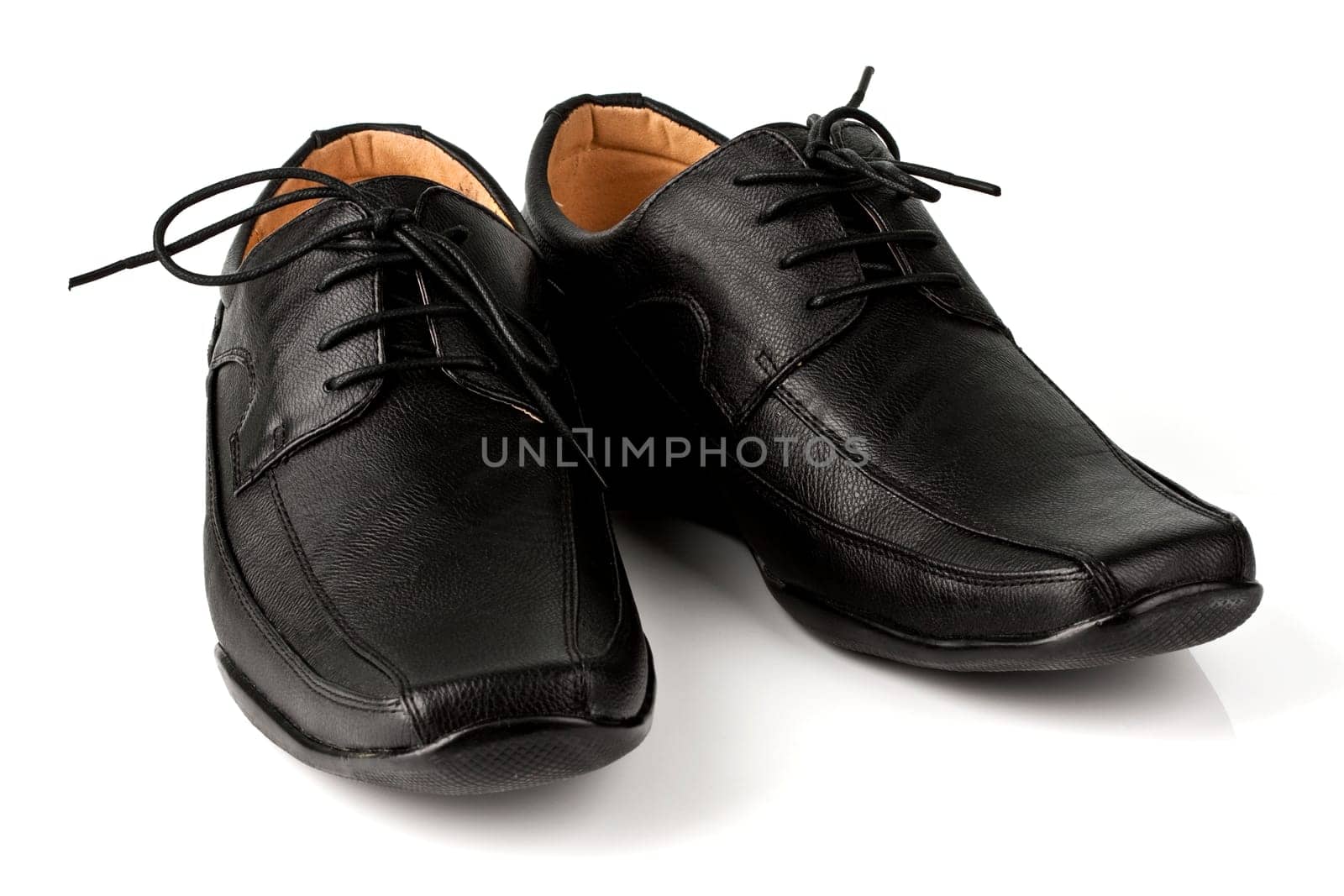 Elegant black leather men&#039 s shoes on white background with shadow.
