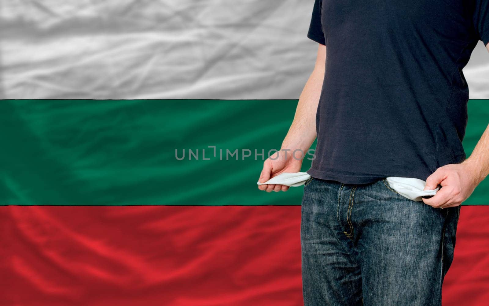 poor man showing empty pockets in front of bulgaria flag
