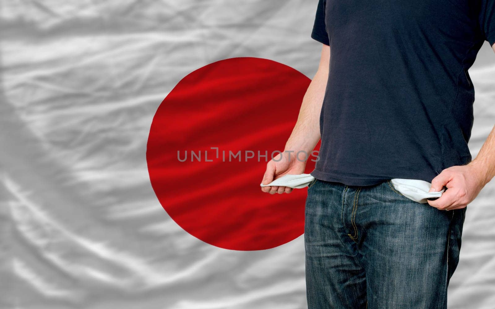 poor man showing empty pockets in front of japan flag