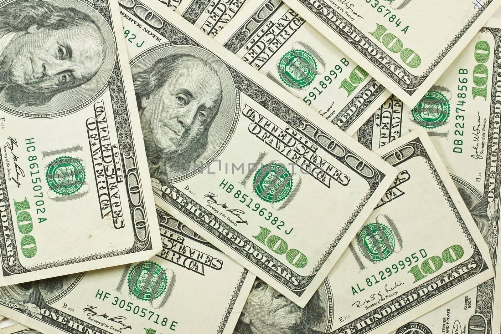 pile of 100 dollar bills background