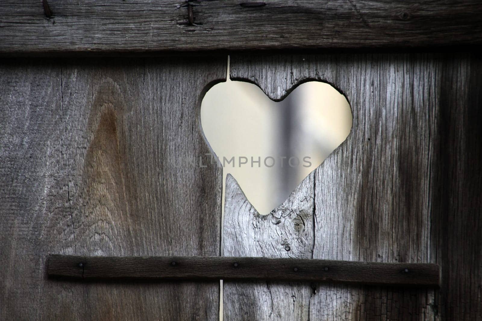 Heart in an old toilet door