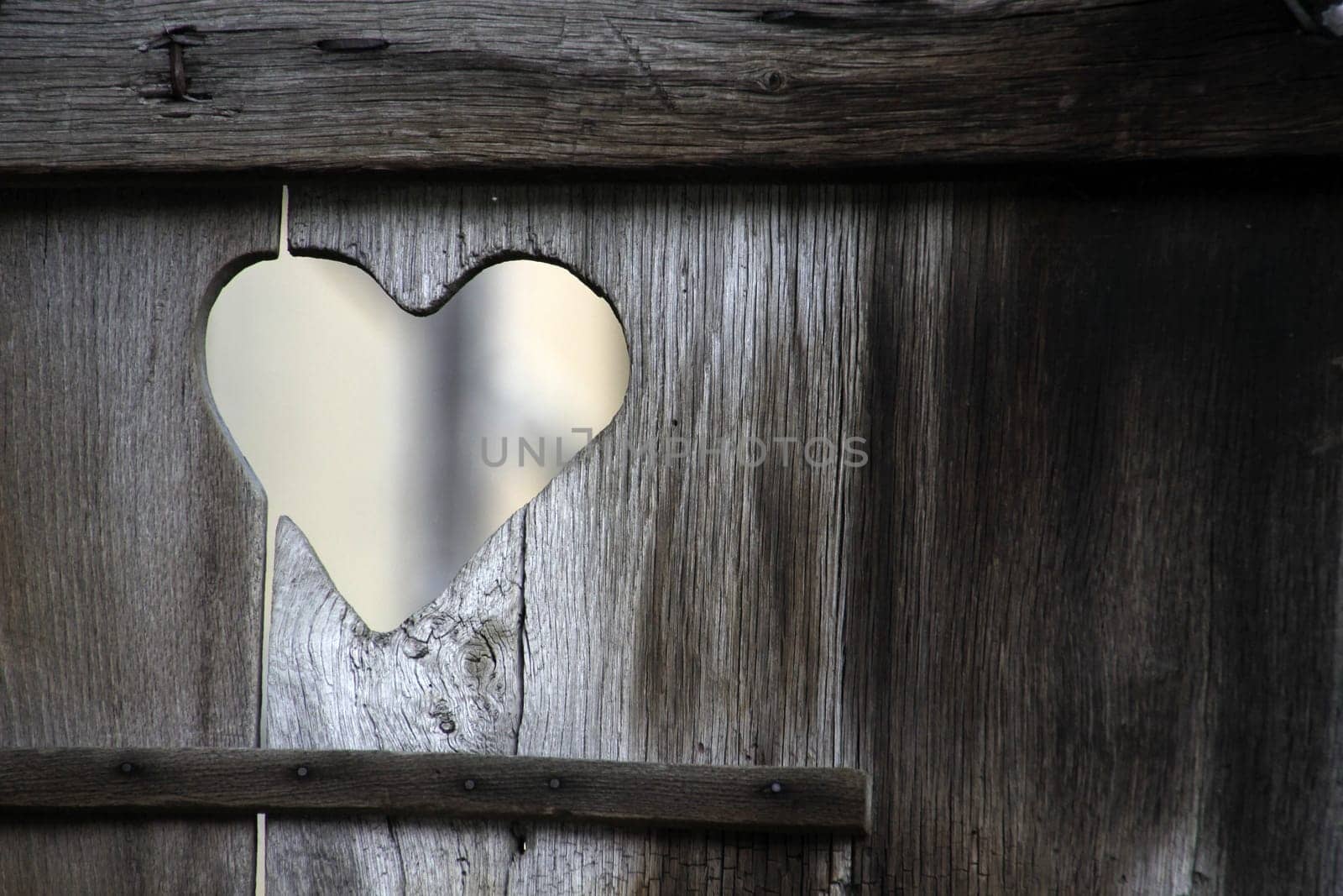 Heart in an old toilet door