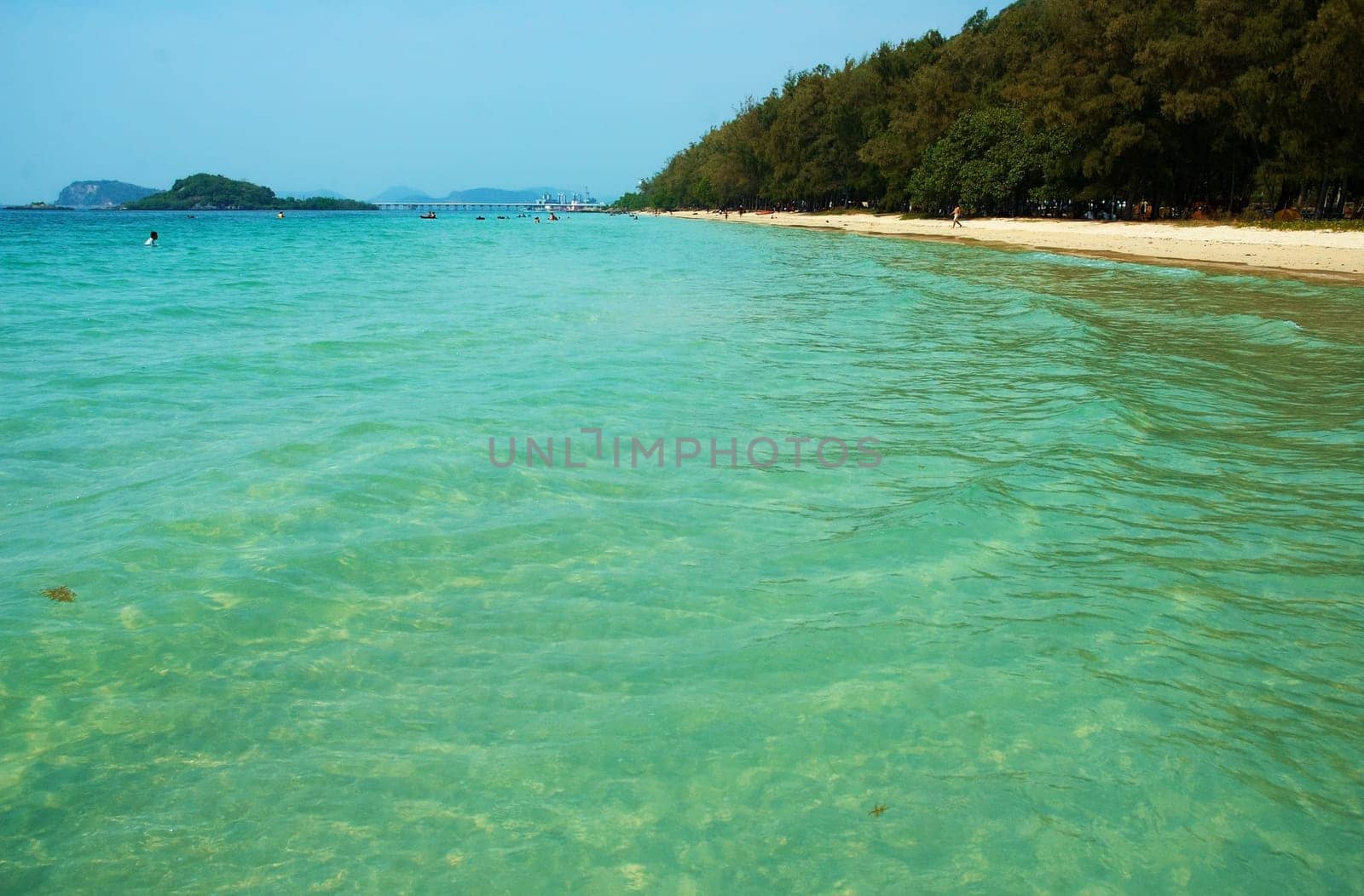 vibrant turquoise water on the seacoast. White sand sea and sun   ideal resort.