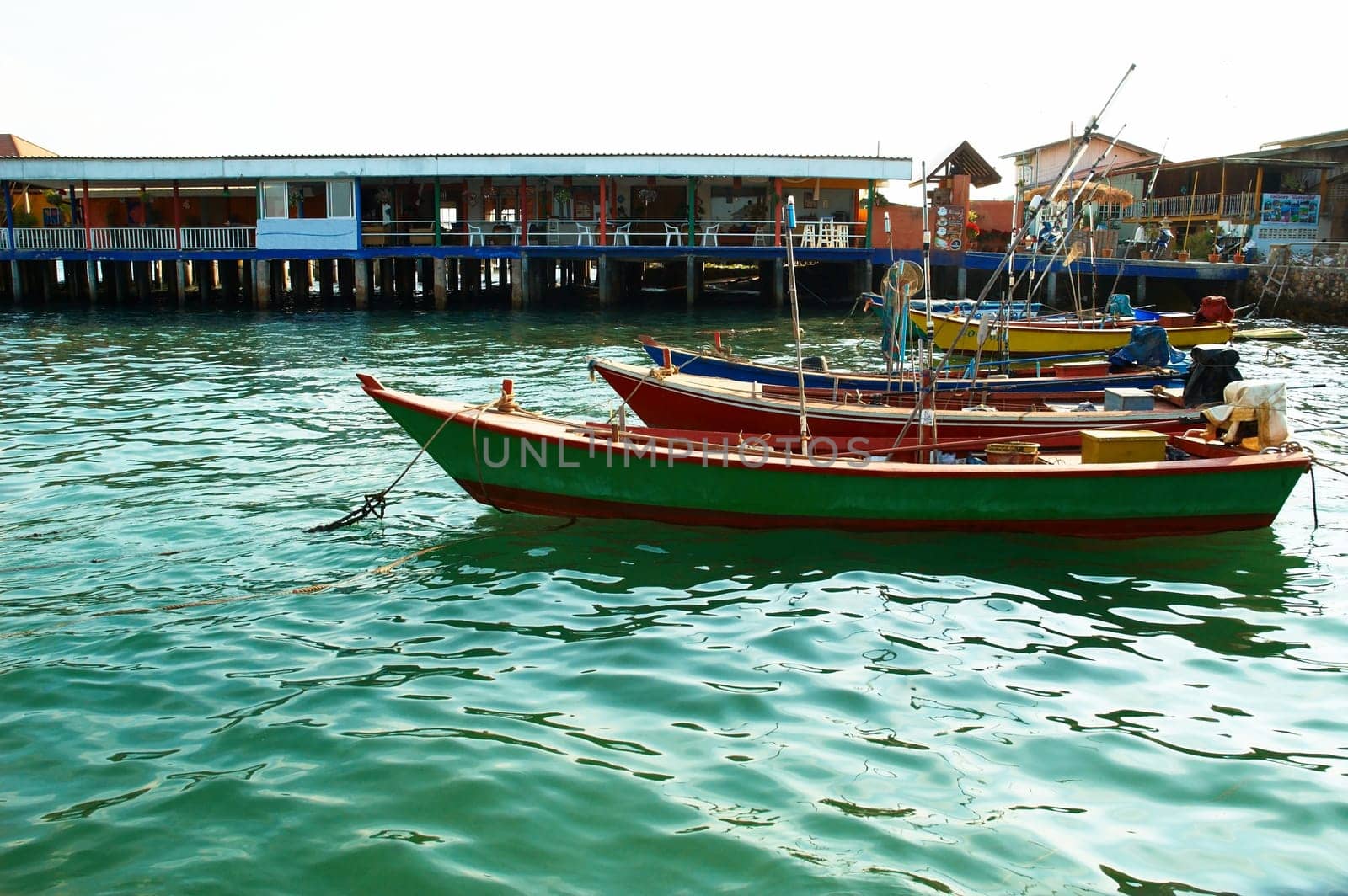Boats, buildings, beach  seacoast urban landscape.