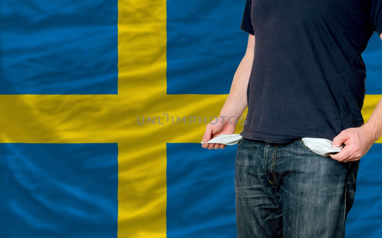 poor man showing empty pockets in front of sweden flag