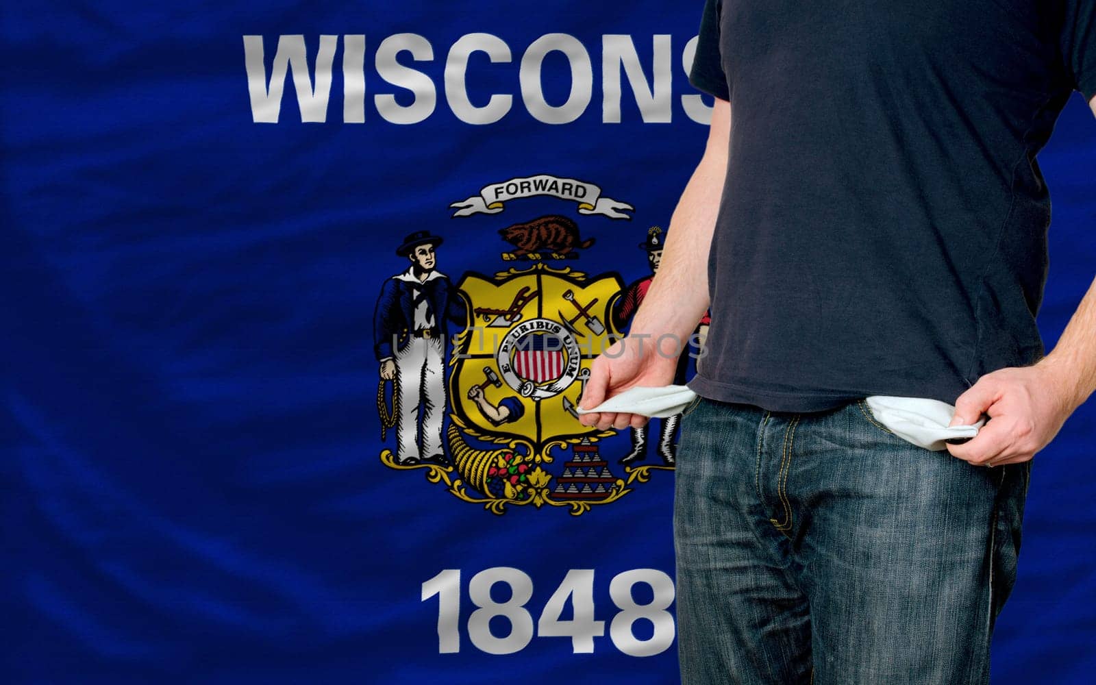 poor man showing empty pockets in front of american state of wisconsin flag