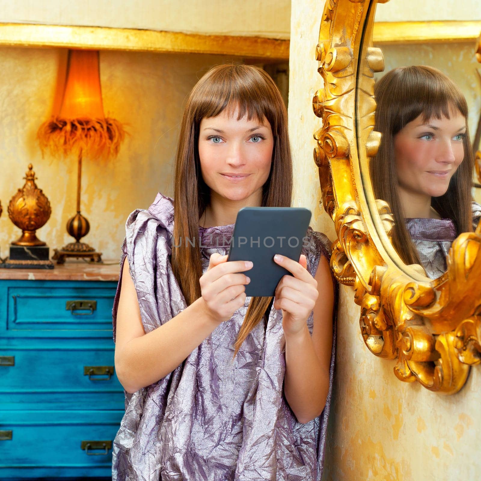 fashion woman reading ebook tablet in vintage grunge house