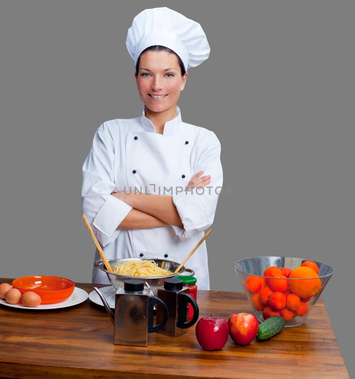 Chef woman portrait with white uniform isolated on grey