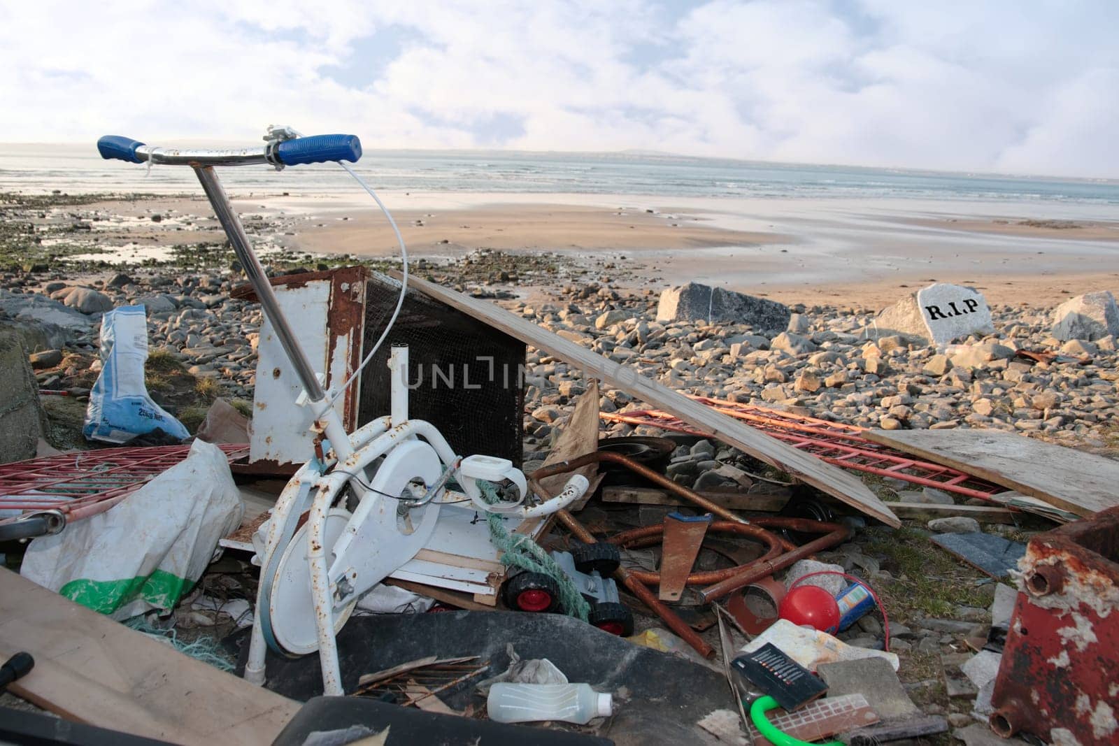 waste dumped on a scenic beach