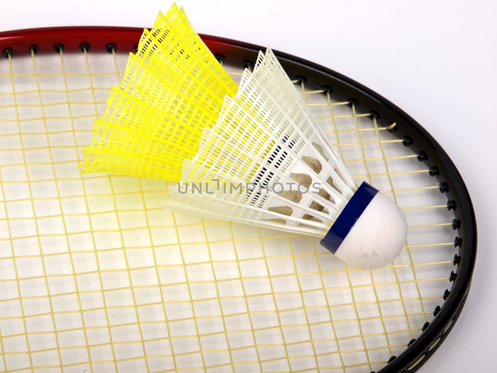 badminton racquet with two balls