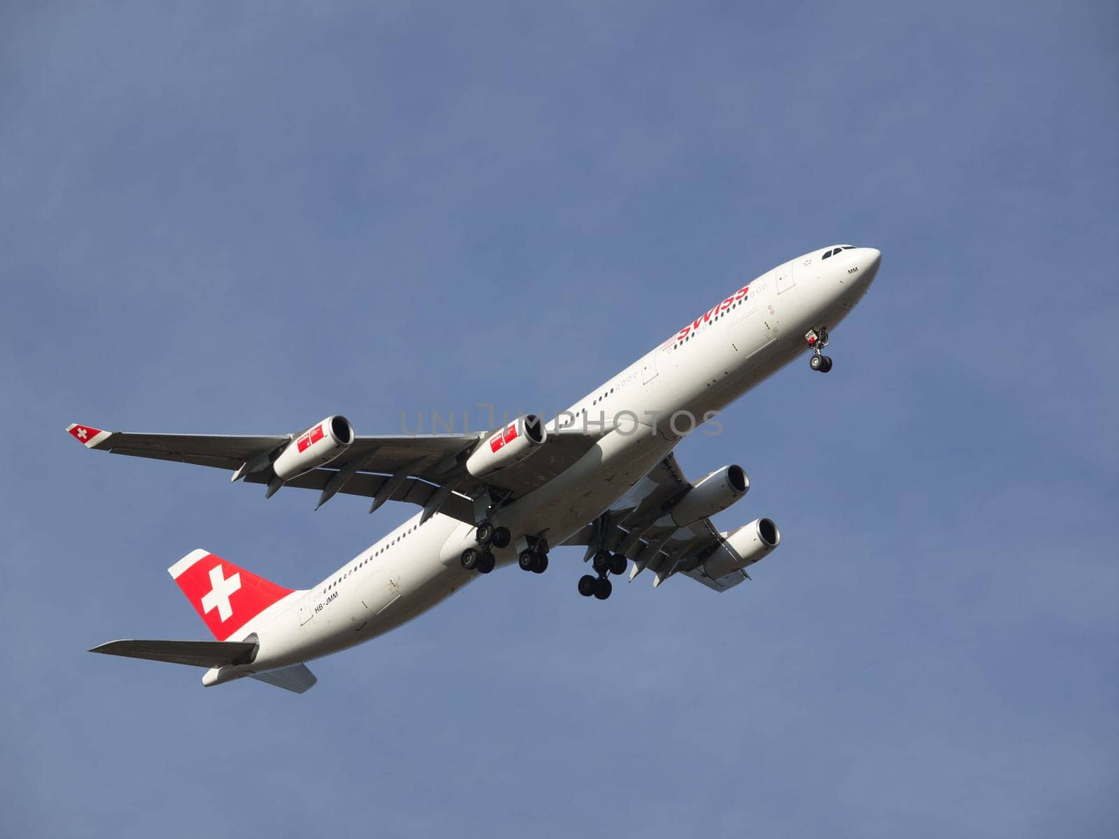 aeroplane fly on the blue sky