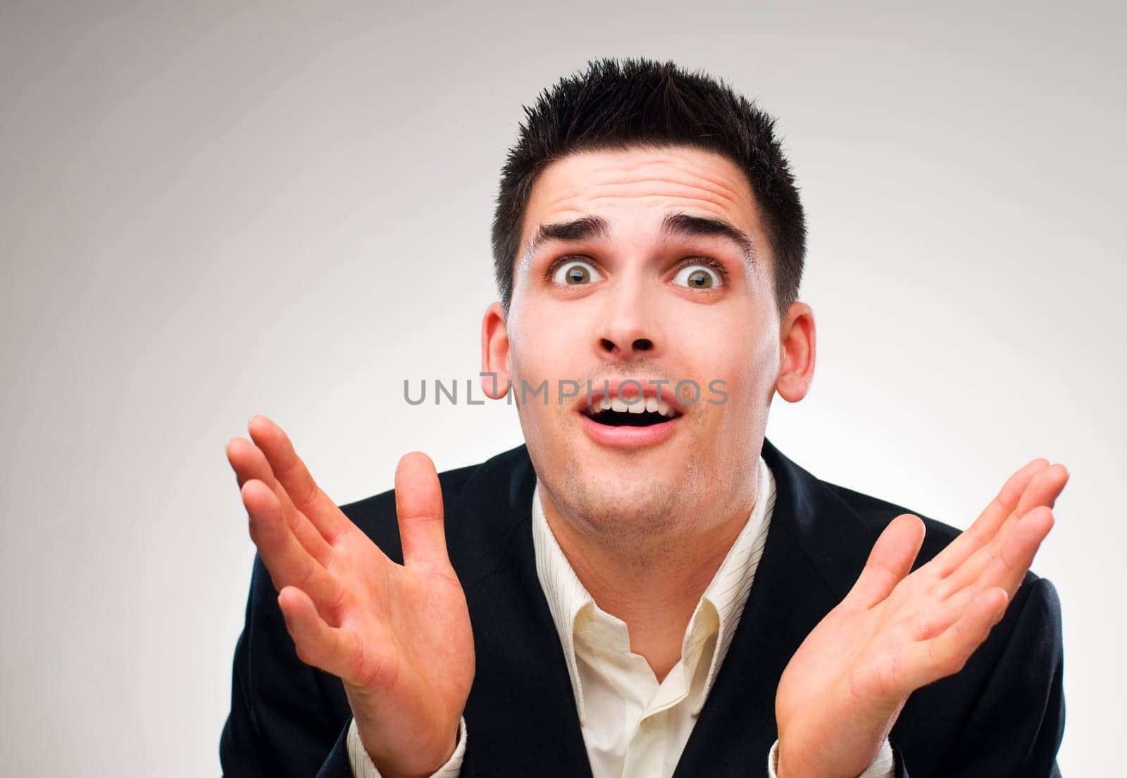 young surprised business men close up shoot
