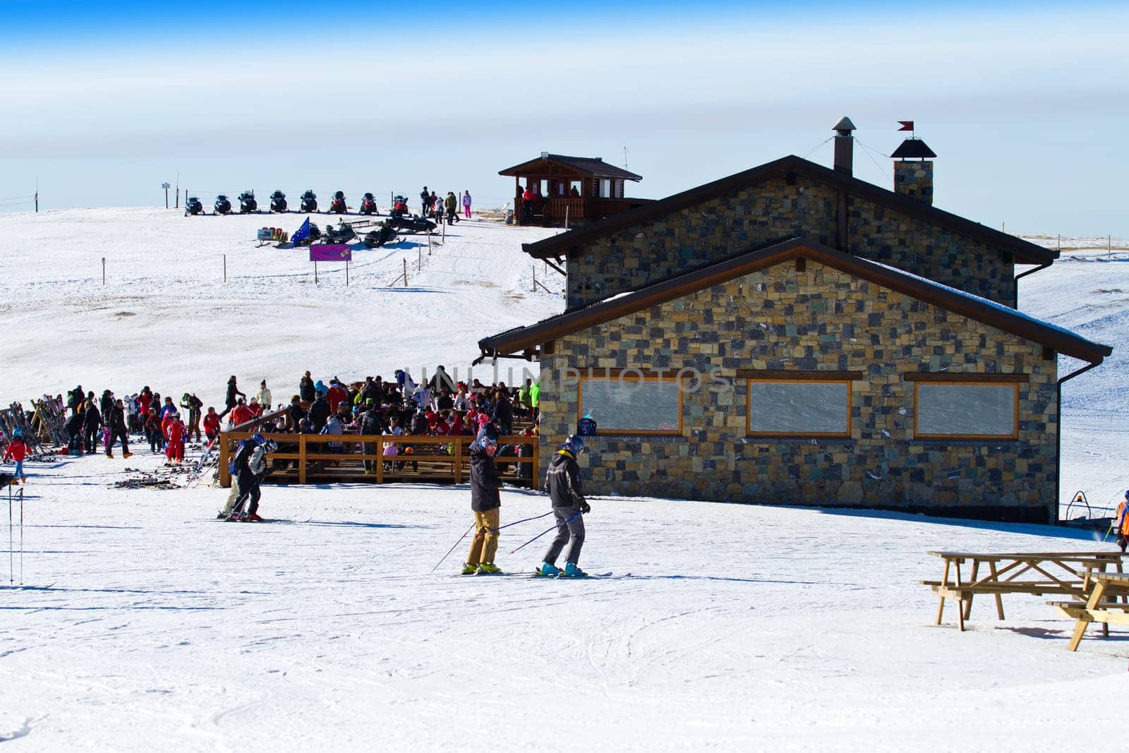 mountain  chalet with skier
