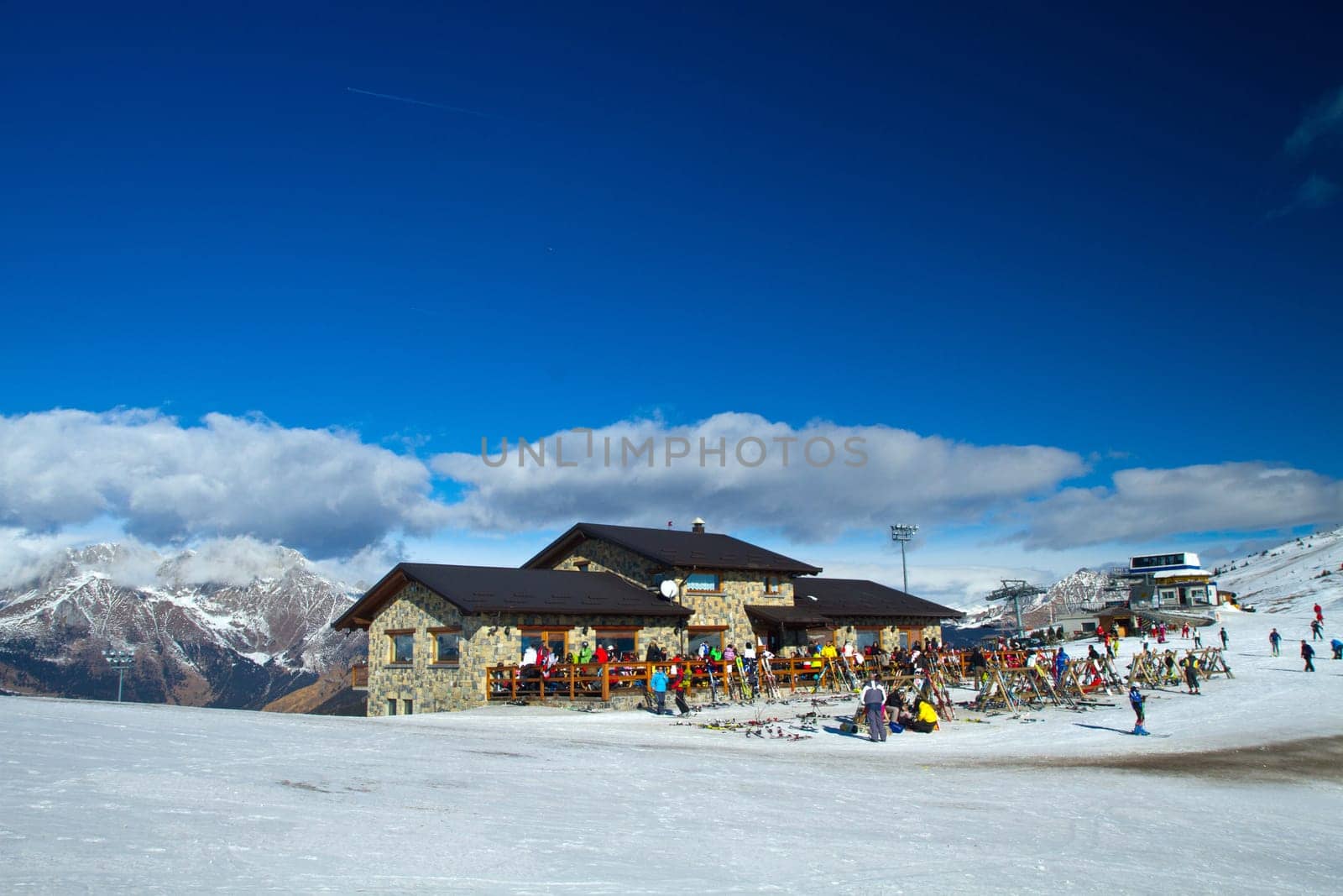 mountain  chalet with skier