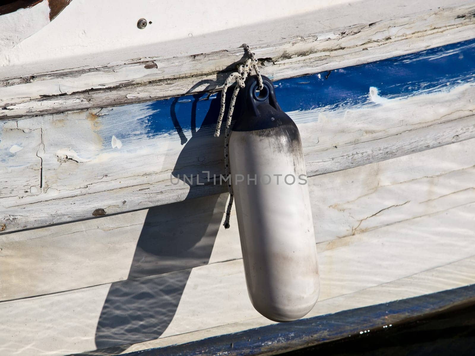 reflection of a boat bumper on the sea