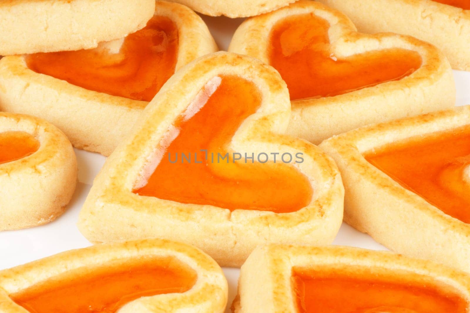 Close-up of some heart shaped apricot jam cookies for a sweet Valentine&#039 s day