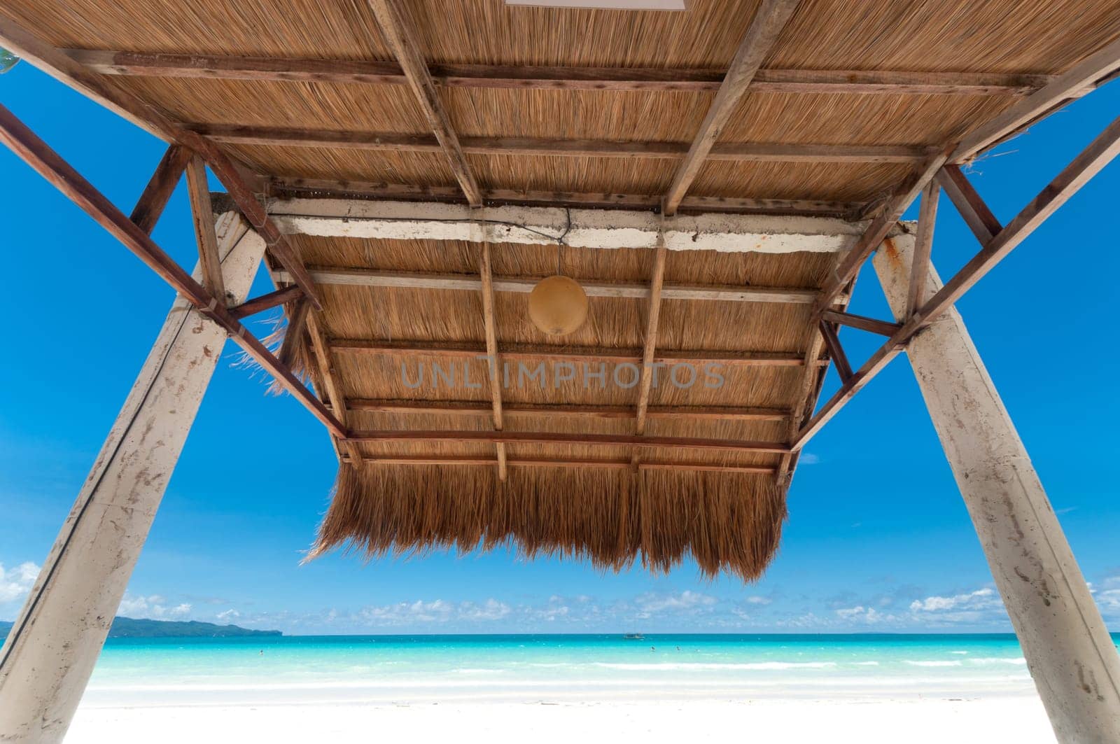 shelter made of natural materials on a tropical beach