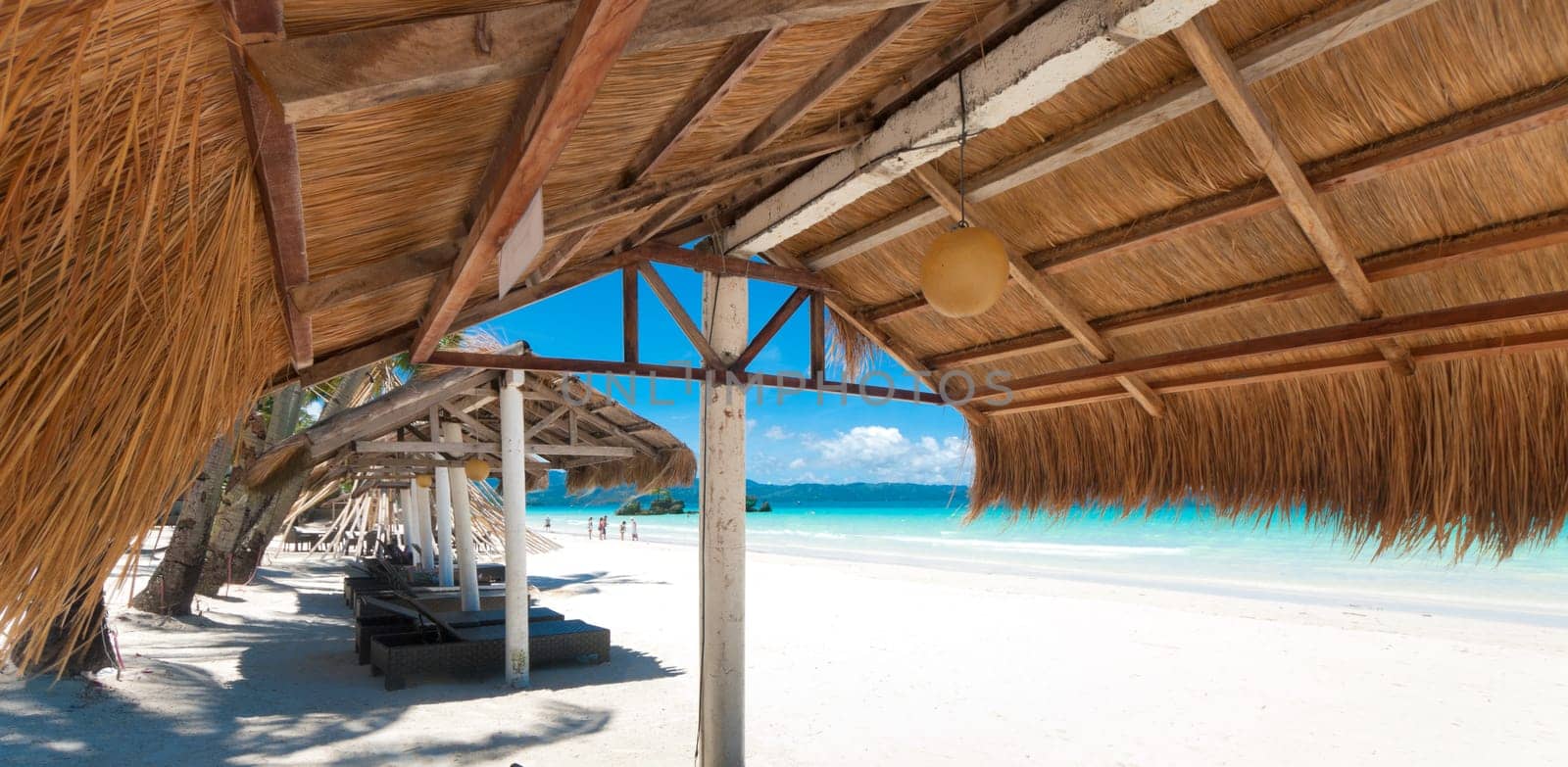 shelter made of natural materials on a tropical beach