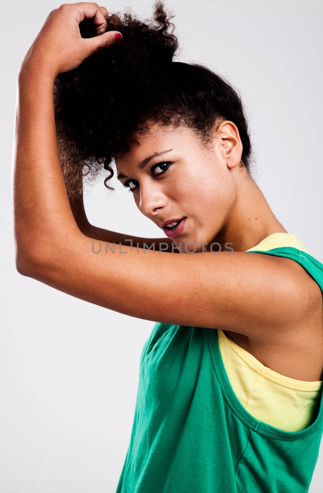 Portrait of a beautiful athletic woman. Studio shot.