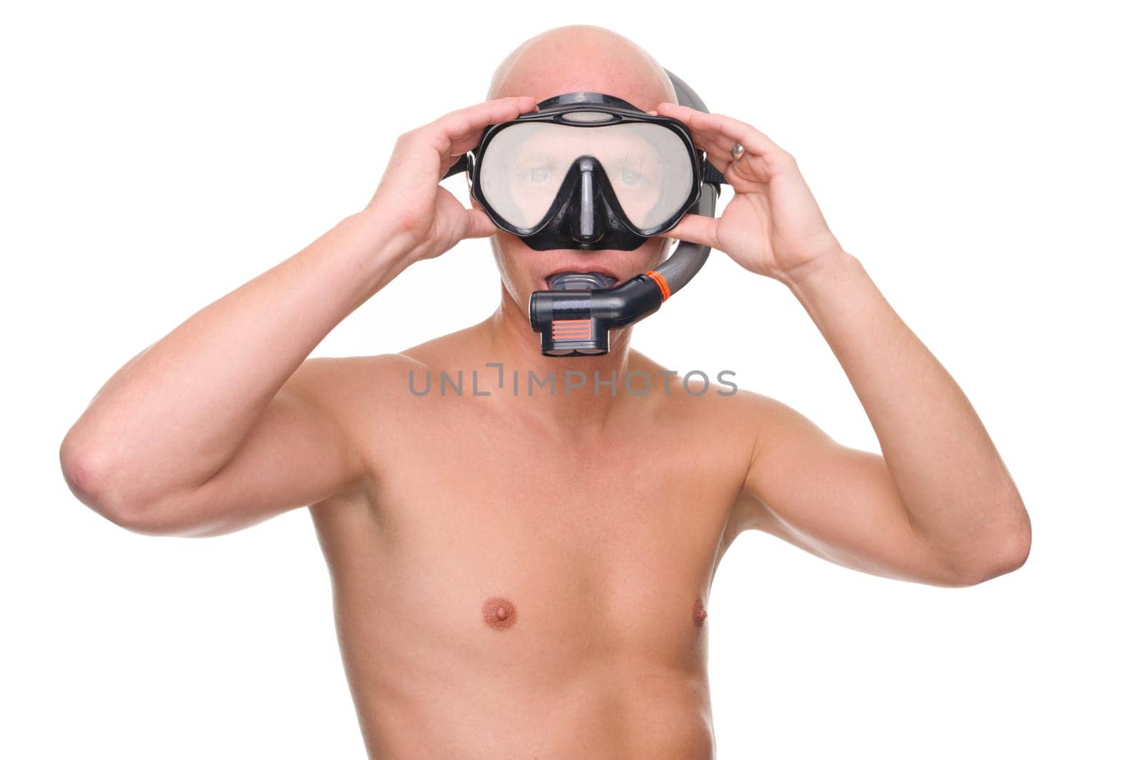 Portrait of a diver in studio against white background