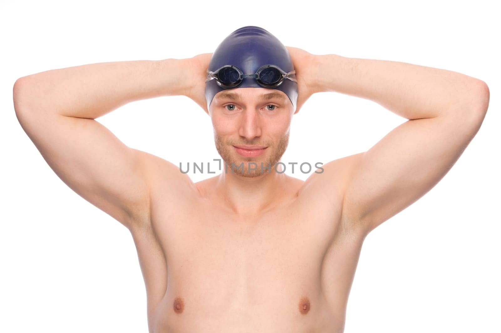 Studio shot of a young swimmer against a white background