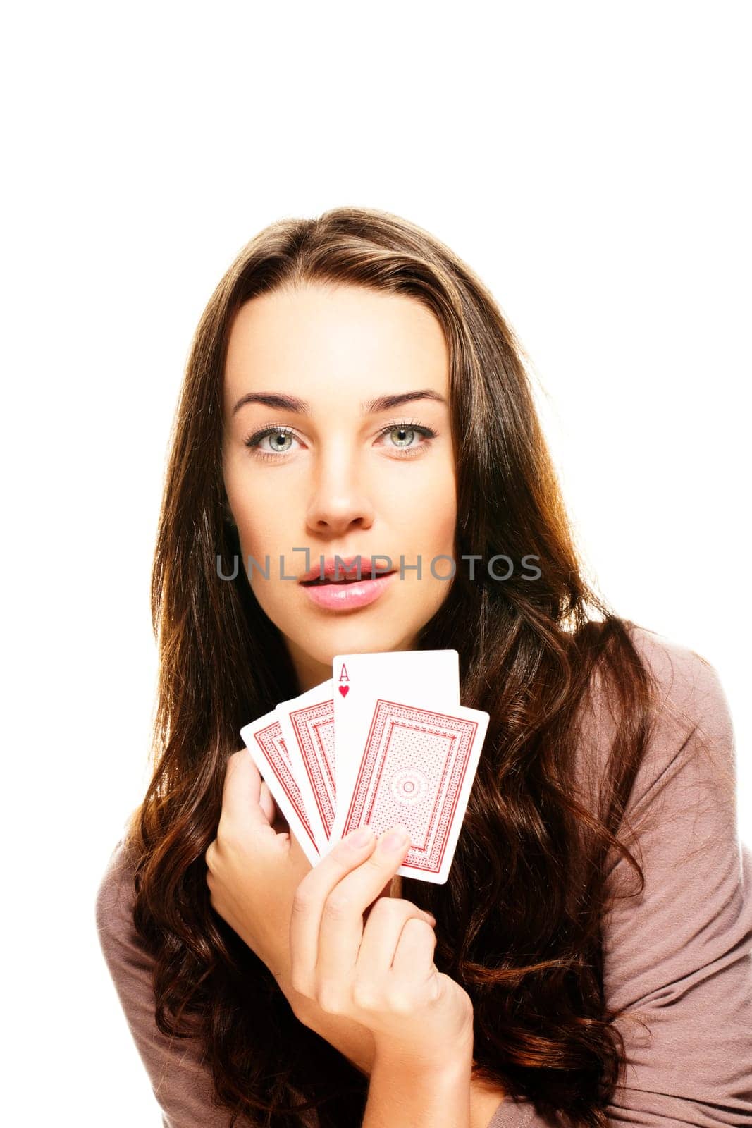 Beautiful woman with poker cards on white background