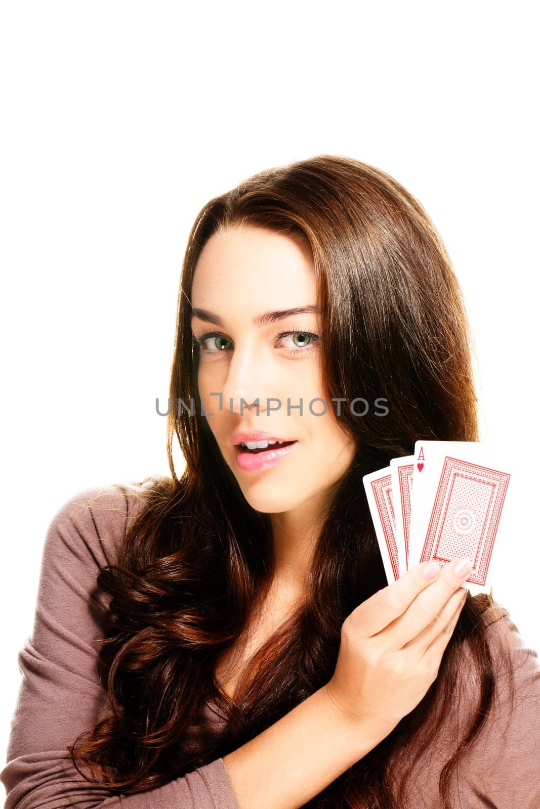 Young beautiful woman with poker cards on white background
