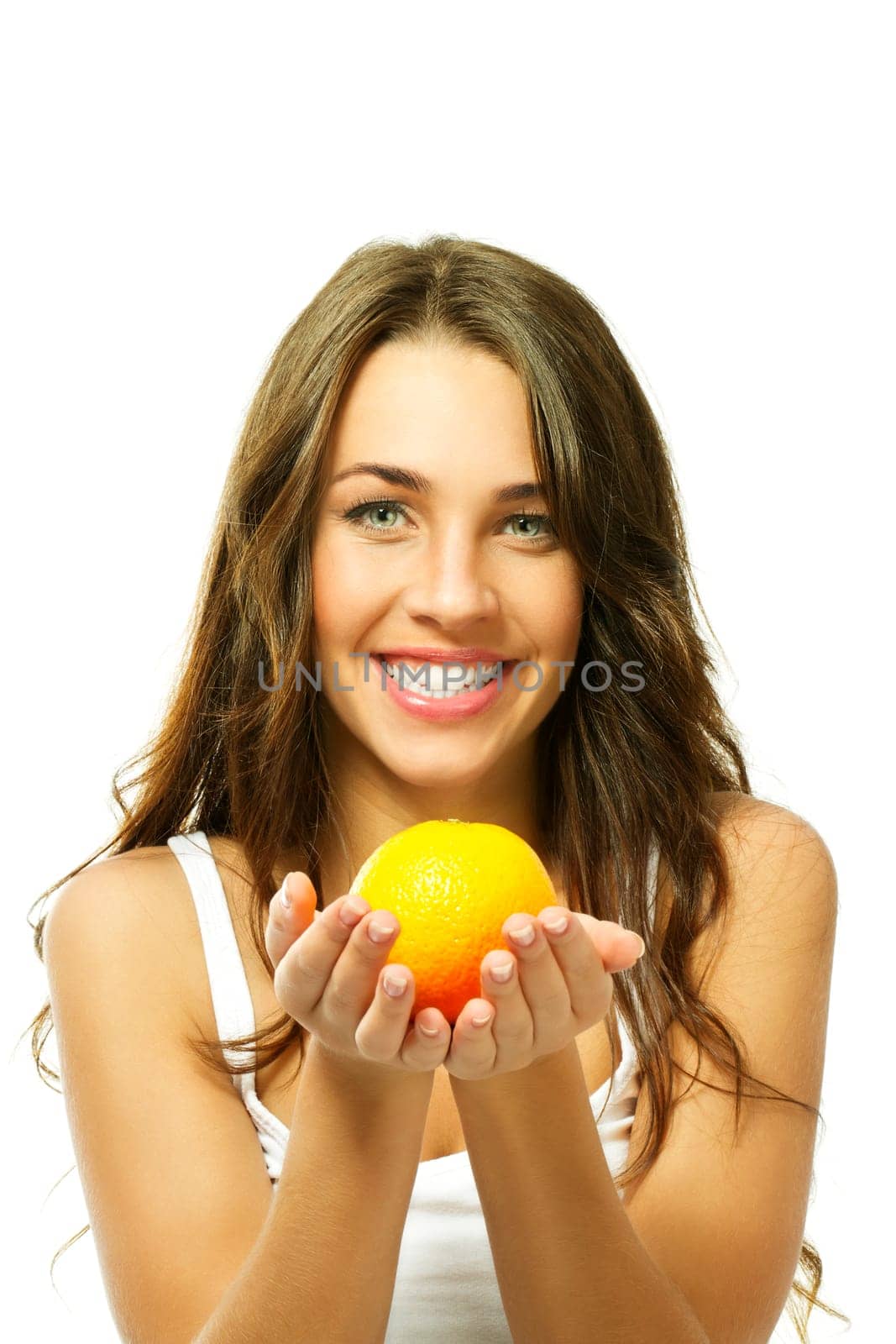 Young woman holding orange on white background