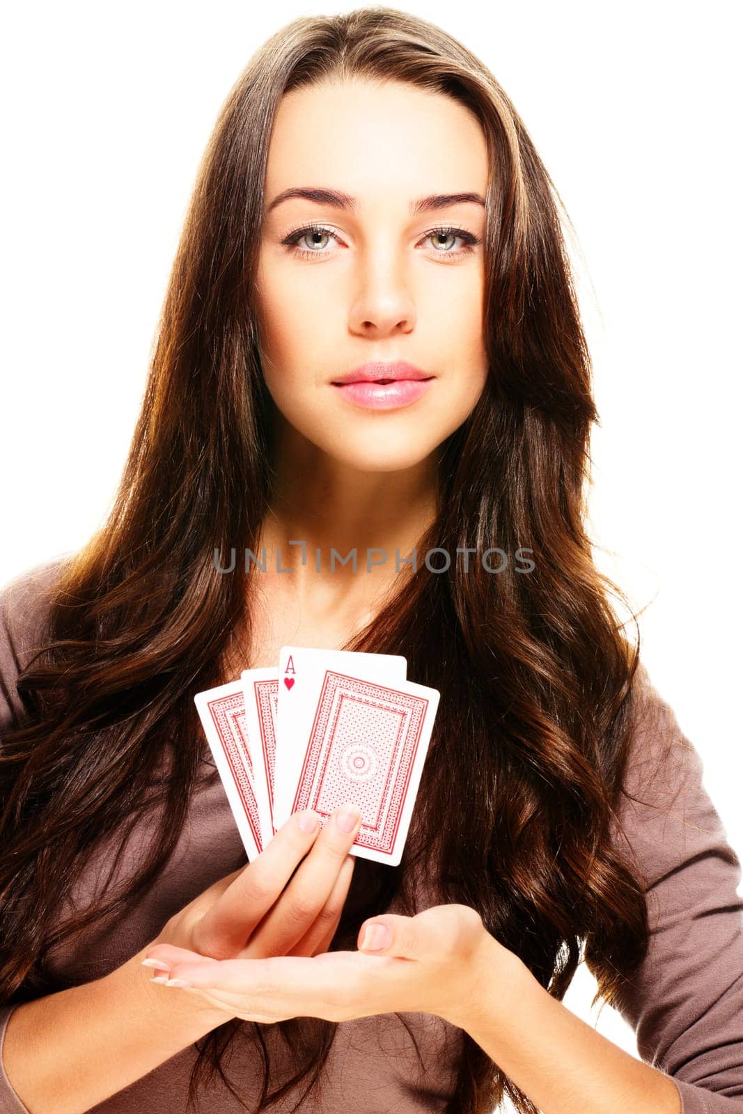 Beautiful woman presenting poker cards on white background