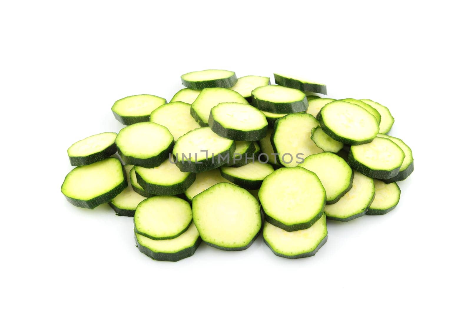 details of a fresh zucchini isolated on white