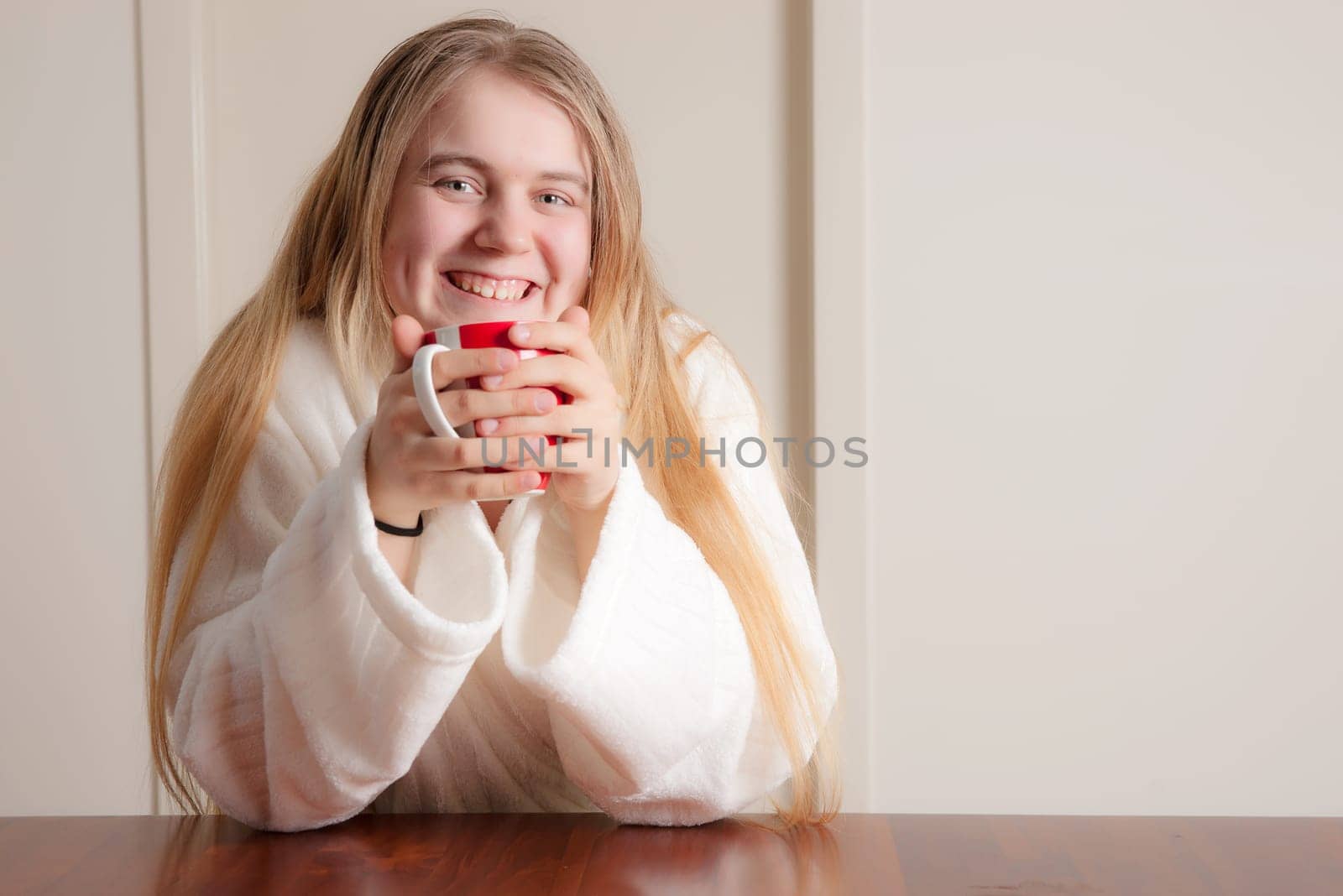 young woman having coffee in the morning