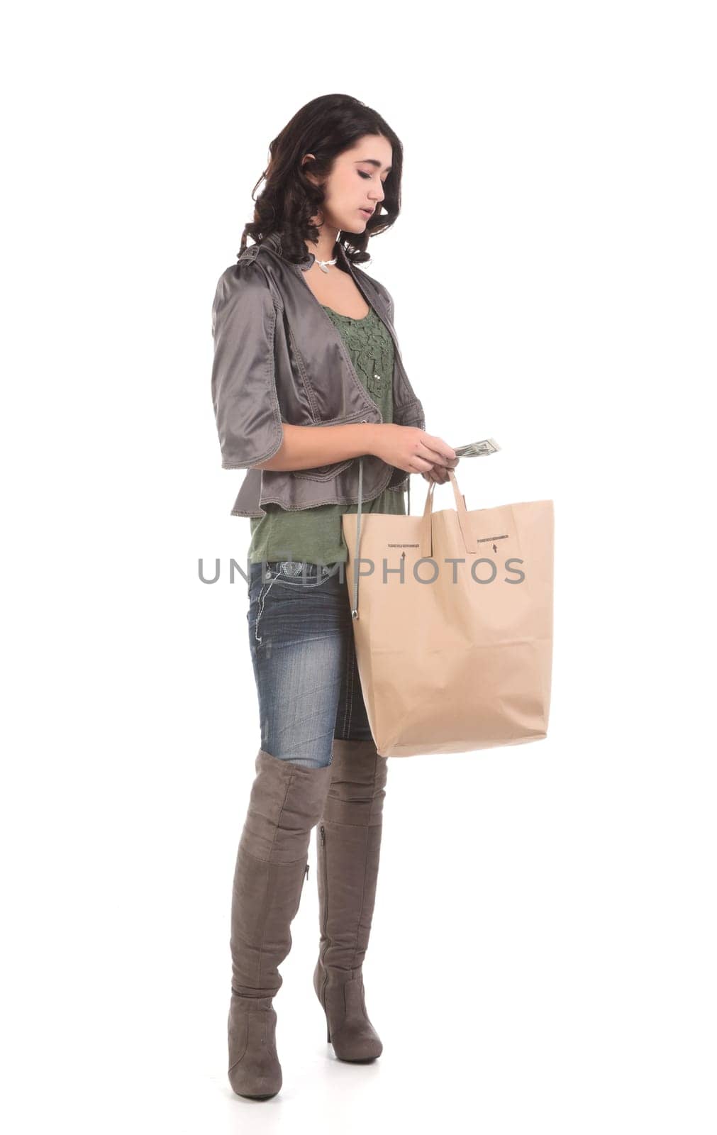 beautiful young teenage woman with shopping bag and cash
