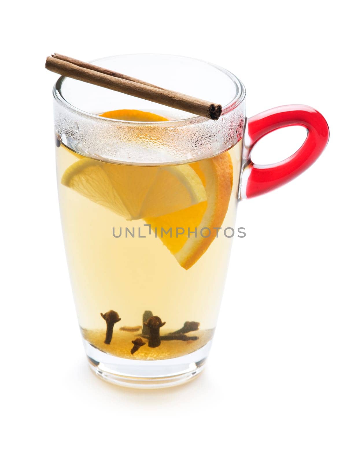 Mulled wine in tall glass isolated on white